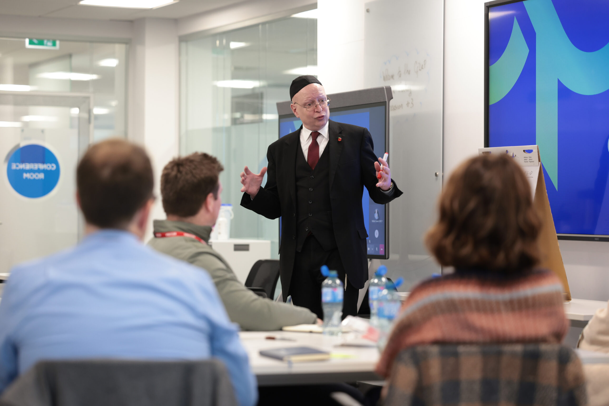 Daniel Greenberg CB leads a session with the 2025 Fellowship cohort.