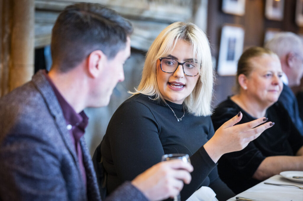 Fellows and guests engage in conversation at the Oxford Union.