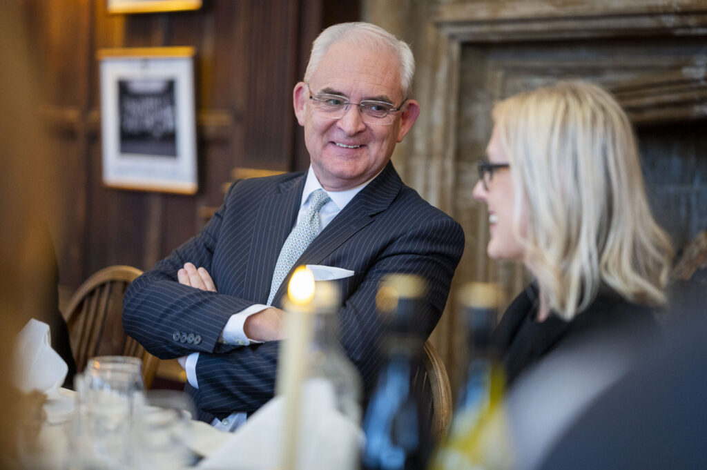 Fellows and guests engage in conversation at the Oxford Union.